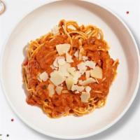 Bottle Service Pasta  · (Vegetarian) Fresh spaghetti cooked in a pink vodka sauce and topped with parmesan, parsley,...