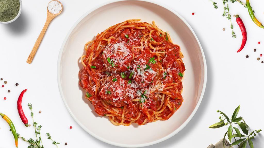 Mob Meatball Pasta  · Fresh spaghetti and homemade ground beef meatballs served with rossa (red) sauce, red pepper flakes, and parmesan.