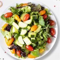 Signature House Salad  · (Vegetarian) Romaine lettuce, cherry tomatoes, carrots, and onions dressed tossed with lemon...