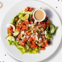 Hearty Greek Salad  · (Vegetarian) Romaine lettuce, cucumbers, tomatoes, red onions, olives, and feta cheese tosse...