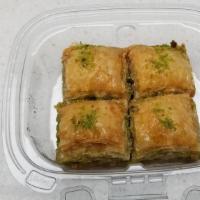 Baklava · a Near Eastern pastry made of many layers of paper-thin dough with a filling of ground nuts,...