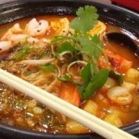 Tom Yum Seafood · Seafood Broth,Scallop, Shrimp, Crab Stick, Soy-Cured Egg , Sweet Corn, Black Mushroom, Scall...