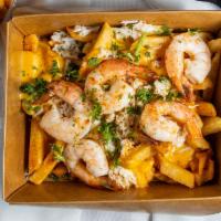 Seafood Loaded Fries · Topped with cheese, sautéed shrimp & fresh lump crab meat.