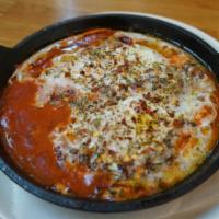 Eggs Purgatory  · spicy tomato sauce, Grilled bread