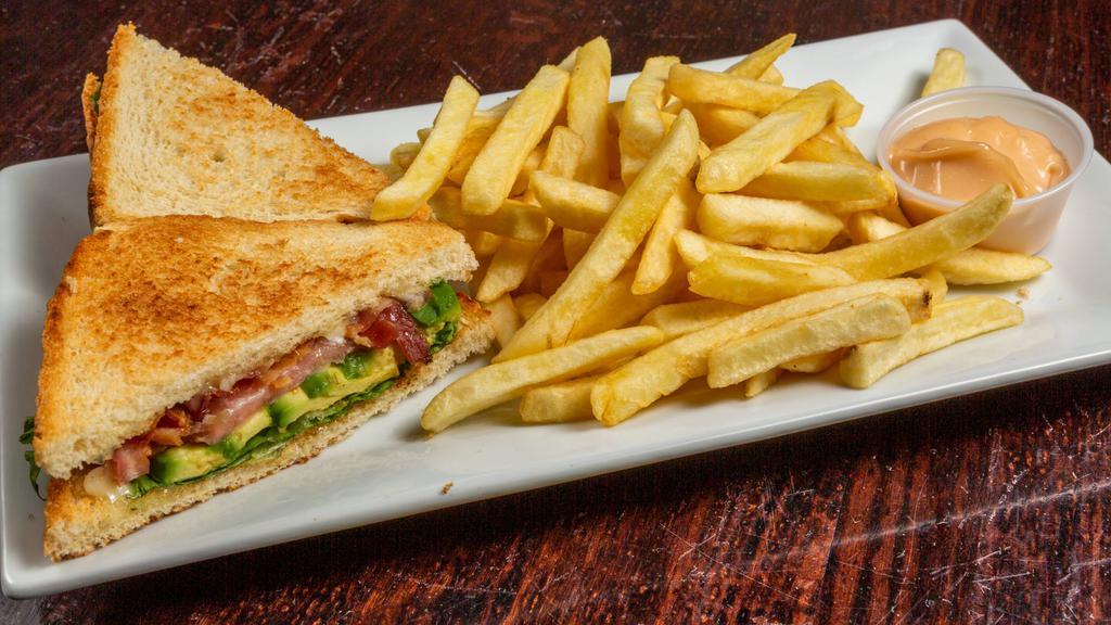 Avocado Blt (Aguacate, Bacon, Lettuce, Tomato) · Mayo and fries.