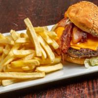 Bandolera Burger · Eight oz burger, bacon, onions, American cheese, tomato, lettuce and fries.