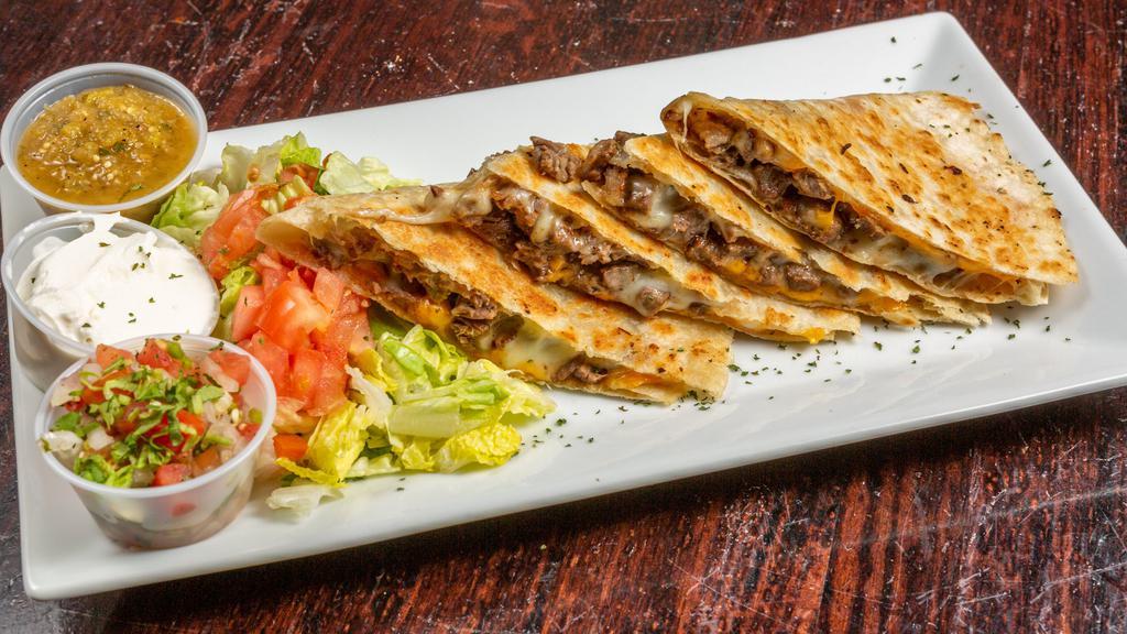 Quesadillas · Your choice of meat, cheese, red and green sauce.