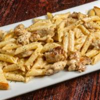 Penne Or Fettuccine Alfredo · With chicken for an additional price.