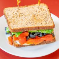 Greek Avocado · Vegetarian. Avocado, olives, roasted peppers, lettuce, pesto, and balsamic. Includes kettle ...