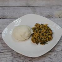 Pounded Yam And Egusi  · served with assorted meat