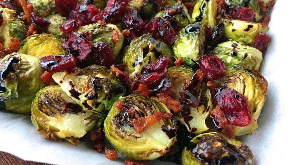 Soy Ginger Brussel Sprouts Side · Homemade honey ginger soy sauce drizzle. Extra dressing for an additional charge.