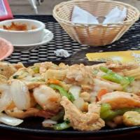 Fajita Ranchera · Chicken, shrimp and scallops, sautéed with onions, garlic, poblano peppers, garbanzo beans, ...