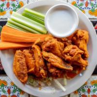 Buffalo Wings · Chicken wings with hot chipotle sauce.