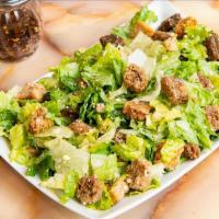 Caesar Salad · Romaine lettuce, croutons, parmesan cheese dressing.