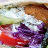 Falafel Sandwich · Served with lettuce, onion, tomato and special sauce.