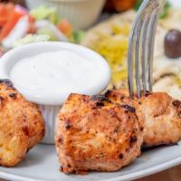 Chicken Shish Kebab · Tender chunks of chicken marinated with chef's own blend of herbs and spices. Served with ri...