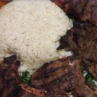Lamb Chops · Baby lamb chops grilled to order, served with rice or hummus or babaghanouj, lettuce, onion,...