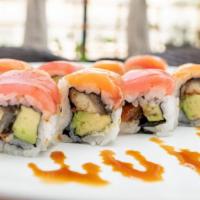 Santi Roll · Eel and avocado topped with salmon and tuna.
