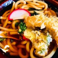 Tempura Udon · Japanese thick noodles in soup with kani, shrimp & vegetable tempura.