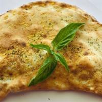 Calzone · Pizza dough pockets filled with seasoned ricotta, mozzarella cheese, and Pomodoro sauce.