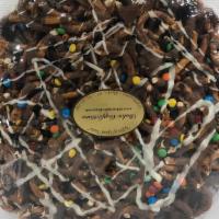 Pretzel Pizzas · Chocolate pizzas made with salty pretzels drizzled in milk/dark and white chocolate and cove...