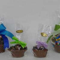 Edible Baskets · Edible chocolate baskets filled with assorted chocolates and truffles.  

HOW IT SHIPS 
Prod...