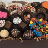C-100 · Our Signature Chocolate Baskets are filled with an assortment of mouth watering gourmet asso...