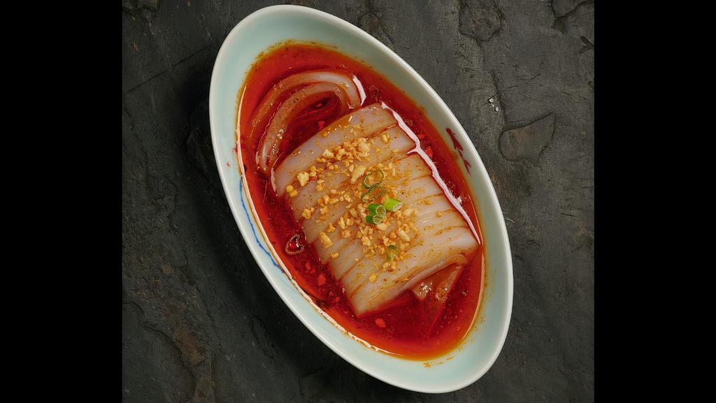 Mung Bean Jelly In Spicy Chili Sauce · Spicy mung bean jelly salad. Served with cold.