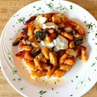 [Gf, V] Romano'S Gnocchi Alla Sorrentina · Handmade gnocchi with tomato sauce, eggplant, and