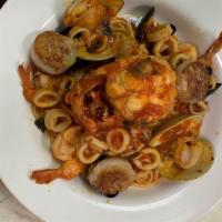 [Gf] Linguine Frutti Di Mare · Clams, lobster tail, calamari, mussels, and shrimp with red sauce over linguini (GF Penne av...