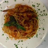 [Gf] Shrimp Fra Diavolo · Shrimp sauteed in a spicy red sauce over linguine
