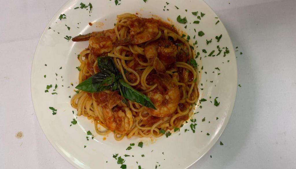 [Gf] Shrimp Fra Diavolo · Shrimp sauteed in a spicy red sauce over linguine