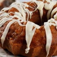 Apple Pound Cake With Ghirardelli White Chocolate Drizzle. Slice / Large · Always made with the freshest apples, orange zest and nutmeg then gently drizzled with ghira...