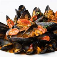 Cozze Al Pomodoro · Fresh mussels sauteed in tomato sauce.