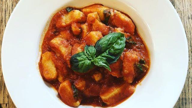 Gnocchi Al Pomodoro · Homemade gnocchi with plum tomato sauce and fresh basil.