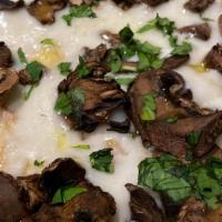 Triple Mushroom Flatbread Pizza · assorted wild mushrooms, truffle oil, mozzarella