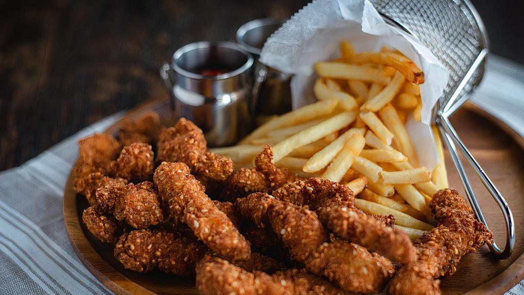Sesame Chicken Fingers · Chicken fingers with sesame and corn flake coating. Served with french fries.