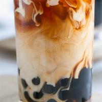 Black Sugar Bubble Tea · Fresh brewed premium tea mixed with choice of milk, oat milk or soy milk.  Topped with black...