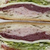 Salt & Pepper · Oven gold turkey and pastrami with Swiss cheese, lettuce, and tomato.