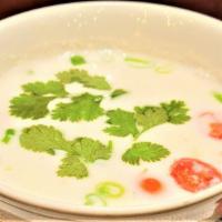 Tom Kha Gai · Original Thai style creamy coconut milk broth with chicken,mushroom, tomato, galangal, lemon...