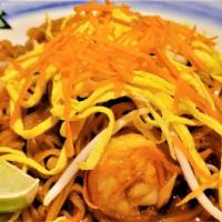 Pad Thai · Gourmet Thai rice noodle sautéed in our chef's special tamarind sauce with beaten egg, fresh...