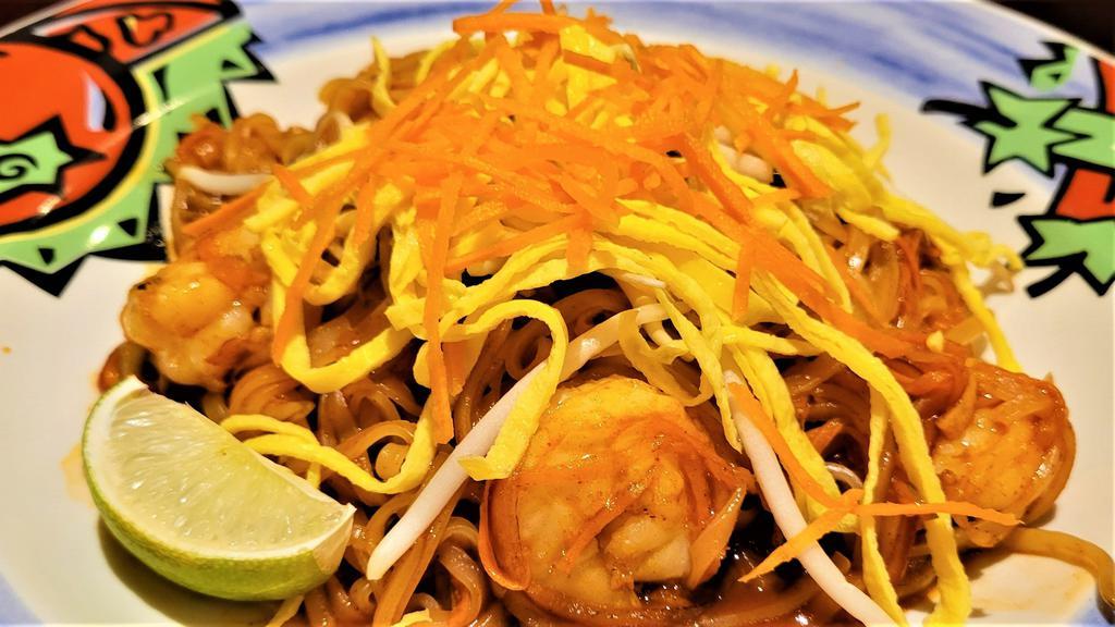 Pad Thai · Gourmet Thai rice noodle sautéed in our chef's special tamarind sauce with beaten egg, fresh bean sprout, and side of roasted peanuts.