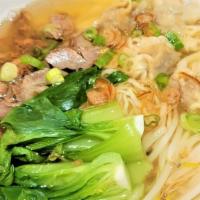 Wonton Noodle Soup · Thin egg noodle with chicken broth, topped with flavored pork, shrimp wonton, and vegetables.