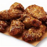 Caesar Wings® – Garlic Parmesan · Oven roasted wings with a creamy Garlic Parmesan sauce (660 Cal)