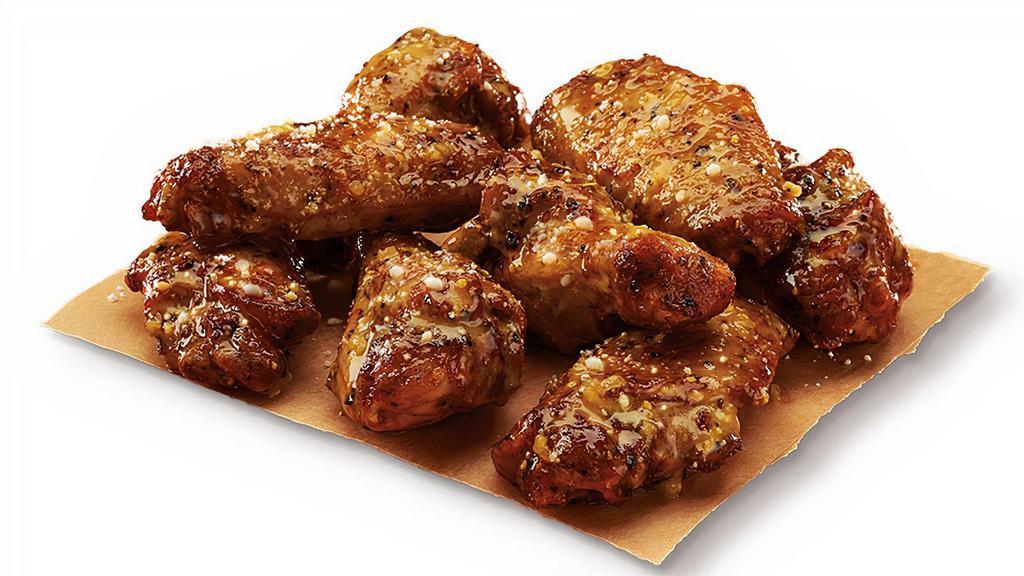 Caesar Wings® – Garlic Parmesan · Oven roasted wings with a creamy Garlic Parmesan sauce (660 Cal)