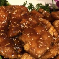 Sesame Chicken · Served with white rice brown rice vegetable fried rice or pork fried rice. choice of egg rol...