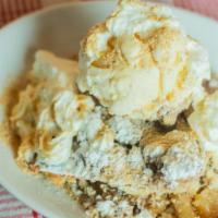 All American Slice Of Apple Pie · topped with graham crackers, vanilla ice cream and whipped cream
