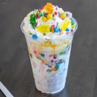The Candy Shoppe · Black and white shake blended with mini m&ms, rainbow sprinkles, heath bar, whipped cream an...