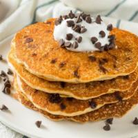 Chocolate Chip Pancakes · Served with three buttery pancakes cooked to perfection and topped with Chocolate chips.