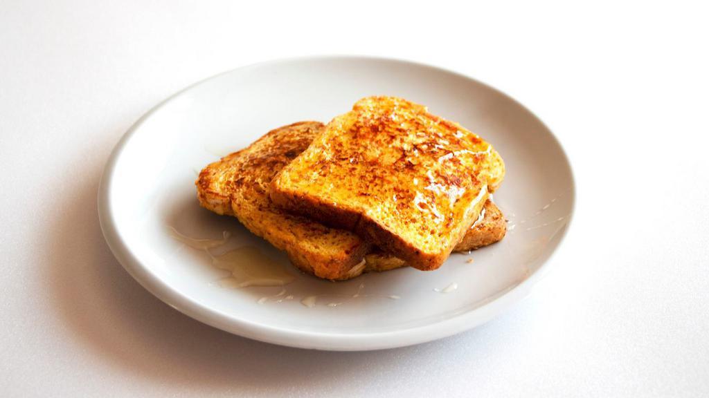 Classic French Toast With Syrup · Classic French Toast cooked to perfection.